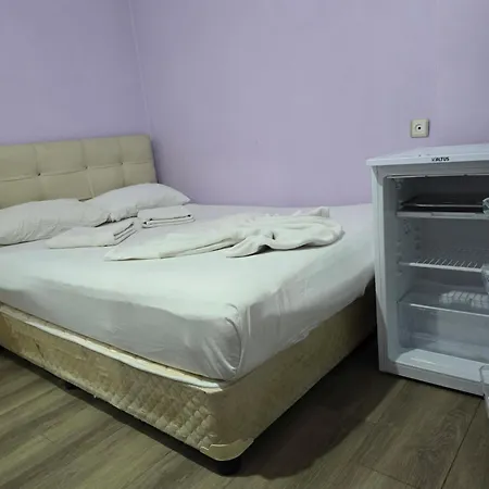 Δωμάτια σε οικογενειακή κατοικία Cesme Pansiyon