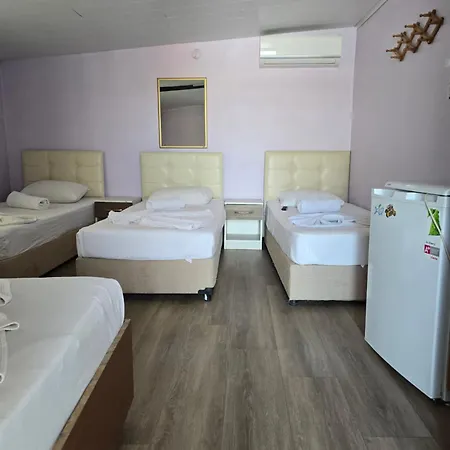 Δωμάτια σε οικογενειακή κατοικία Cesme Pansiyon *