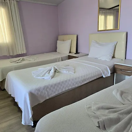 Δωμάτια σε οικογενειακή κατοικία Cesme Pansiyon