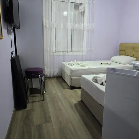 Δωμάτια σε οικογενειακή κατοικία Cesme Pansiyon *